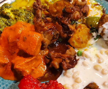 Saffron Grill signature dishes Chicken Tikka Masala
Butter Chicken
Garlic Naan